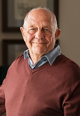 Closeup of senior man smiling at home
